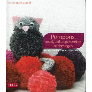 Afbeelding van Pompons, speelgoed en gepunnikte hebbedingen